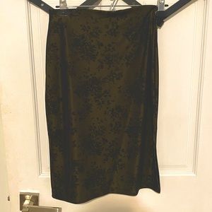 Olive green pencil skirt with floral pattern, and a side slit very elegant skirt